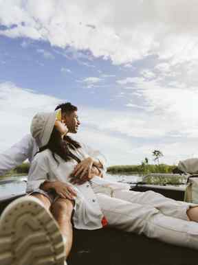 Couple enjoying luxury safari experience in Botswana wilderness