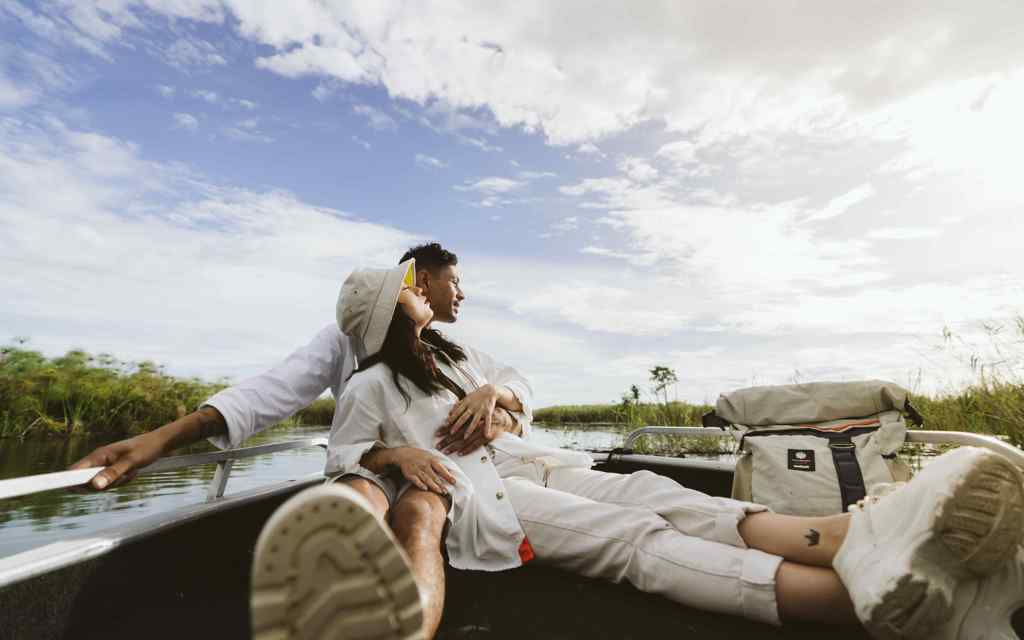 Couple enjoying luxury safari experience in Botswana wilderness