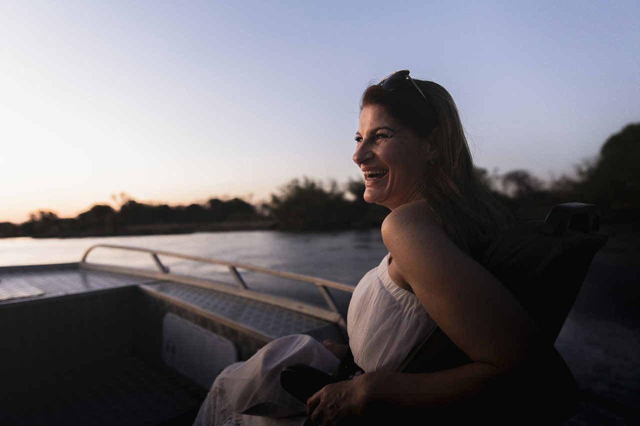 Woman enjoying the calm of the Zambezi River