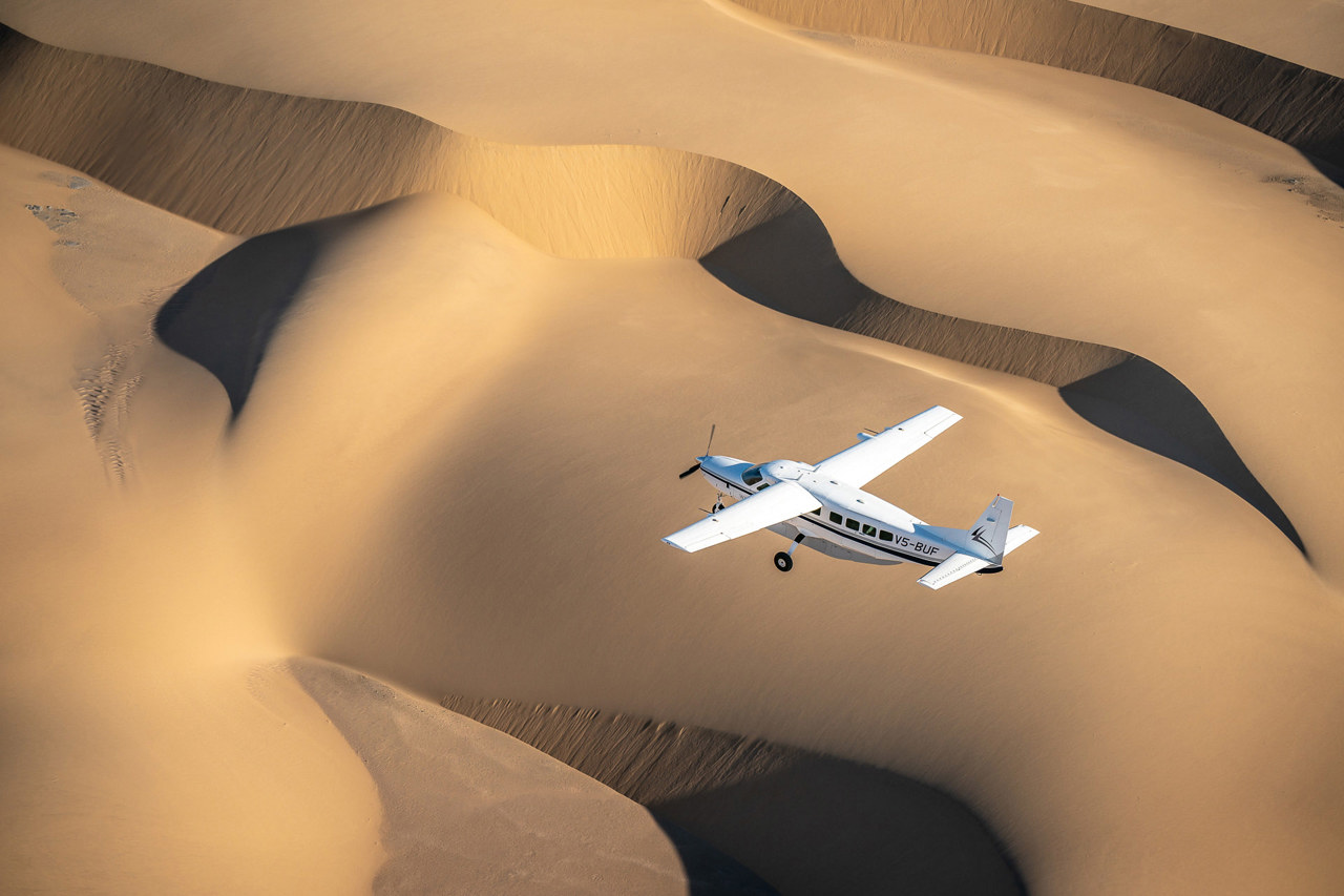 Charter flight over the scenic dunes in Namibia Wilderness Family Wilderness Air Namibia
