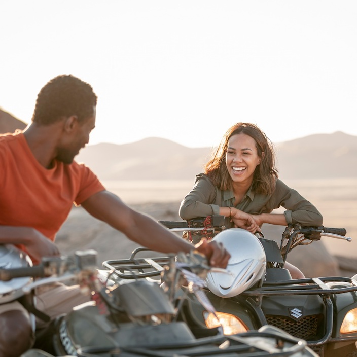 Guests from Little Kulala quad biking in the Namib Desert