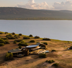 An aerial view of Wilderness Magashi Peninsula on the banks of the lake in Akagera Rwanda