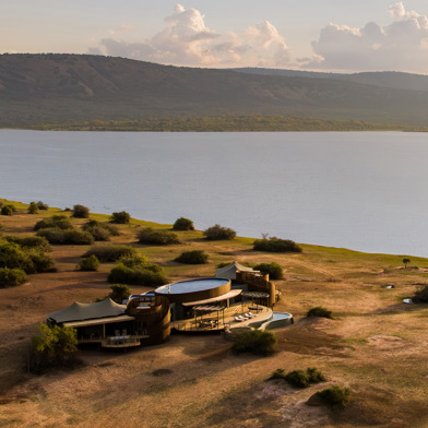 An aerial view of Wilderness Magashi Peninsula on the banks of the lake in Akagera Rwanda