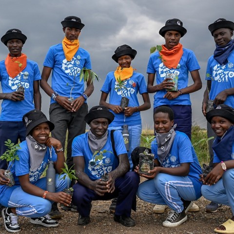 Children planning trees from the nursery Enkereri Primary School Kids Wilderness Kenya