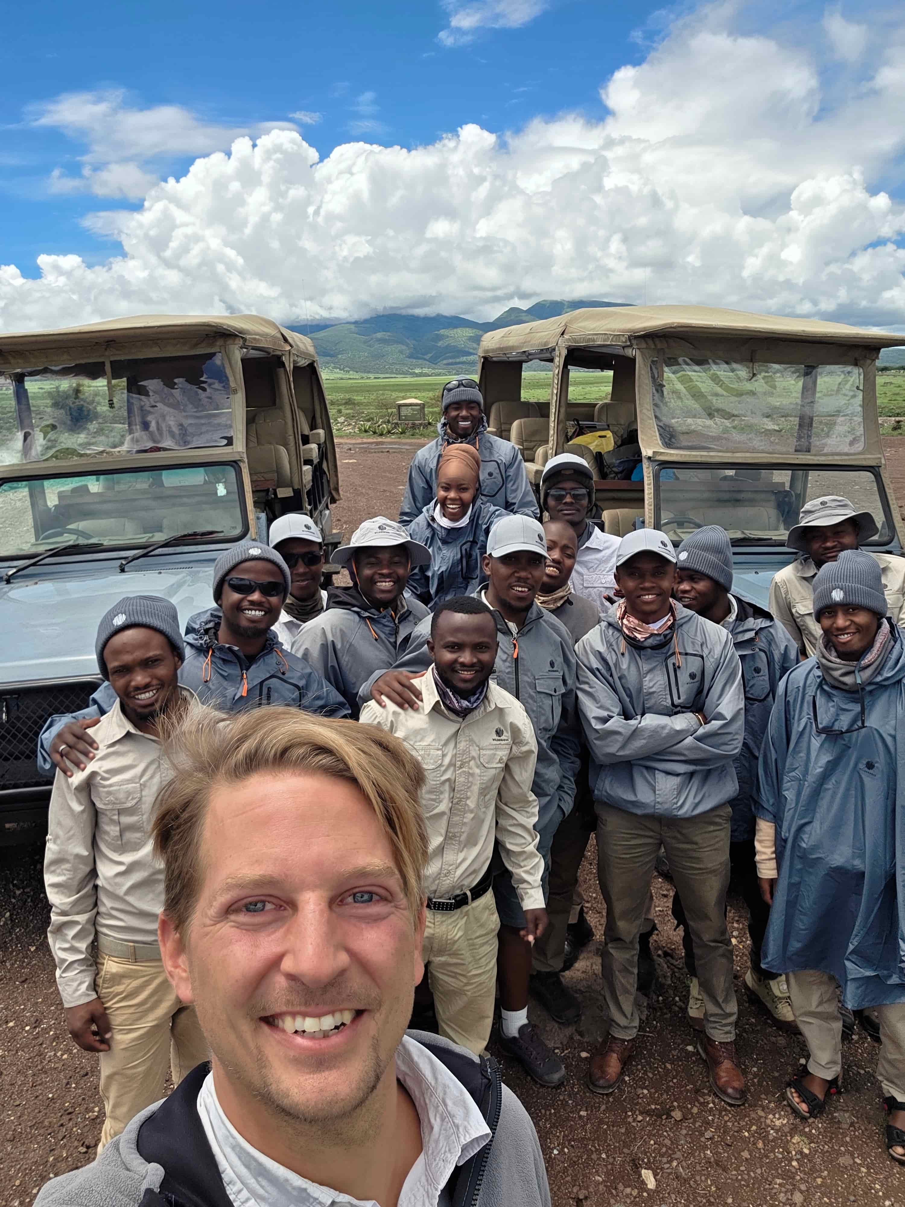 Group of safari guides departing on a training expedition in Tanzania