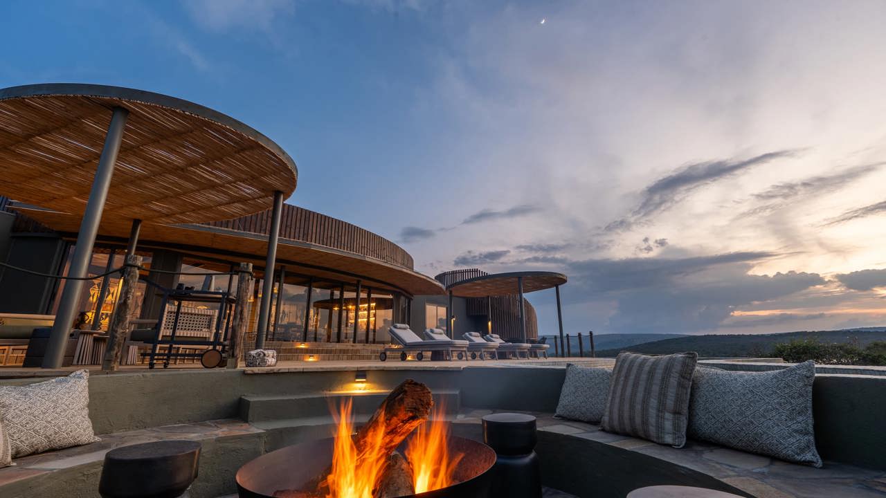 A roaring camp fire on the private deck of the Villa at Magashi Peninsula