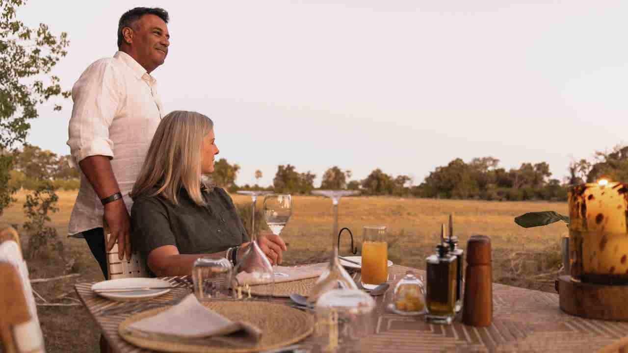 Guest dining while watching wildlife at Qorokwe
