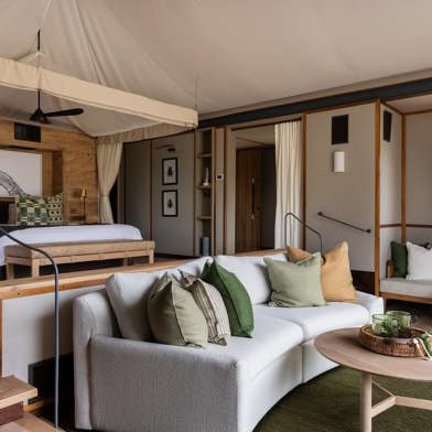 Spacious king suite with sunken lounge area at Wilderness Chitabe