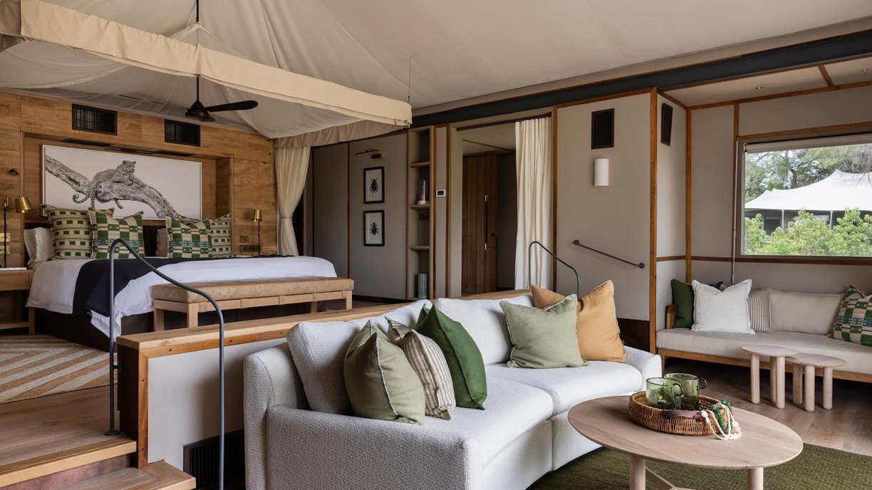 Spacious king suite with sunken lounge area at Wilderness Chitabe