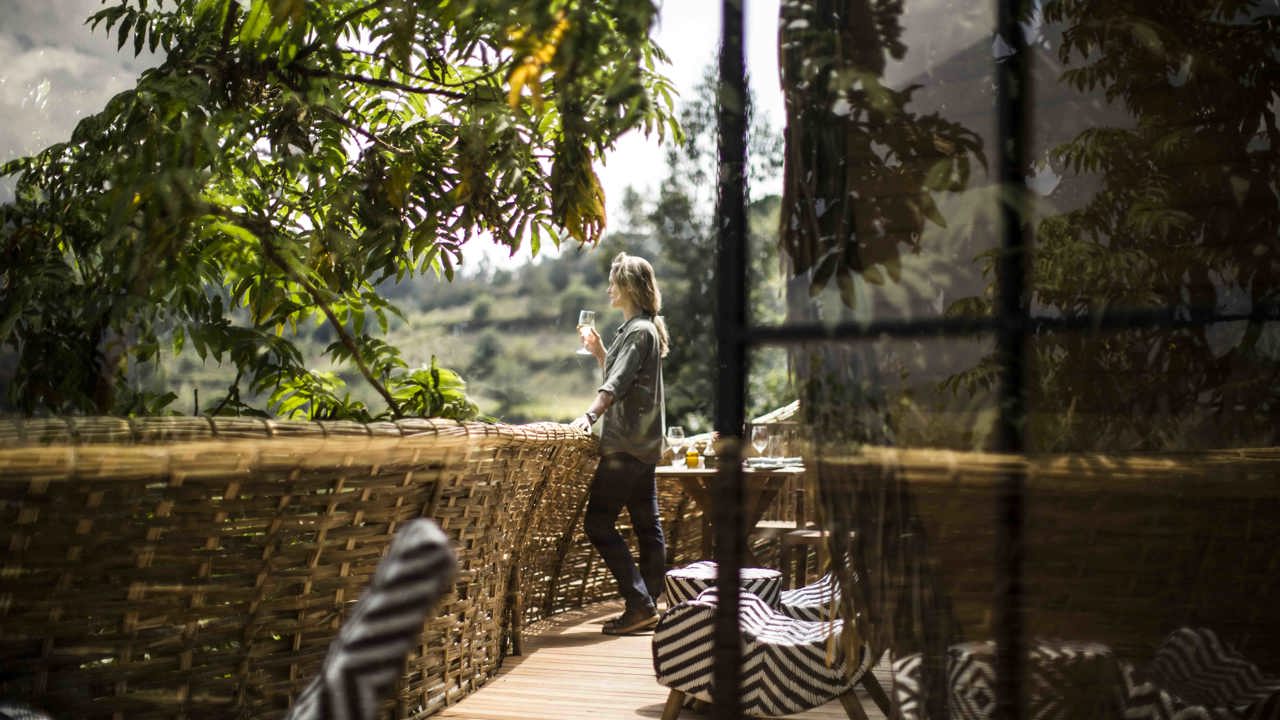 Wilderness Bisate Rwanda Balcony Coffee & Volcanoes view