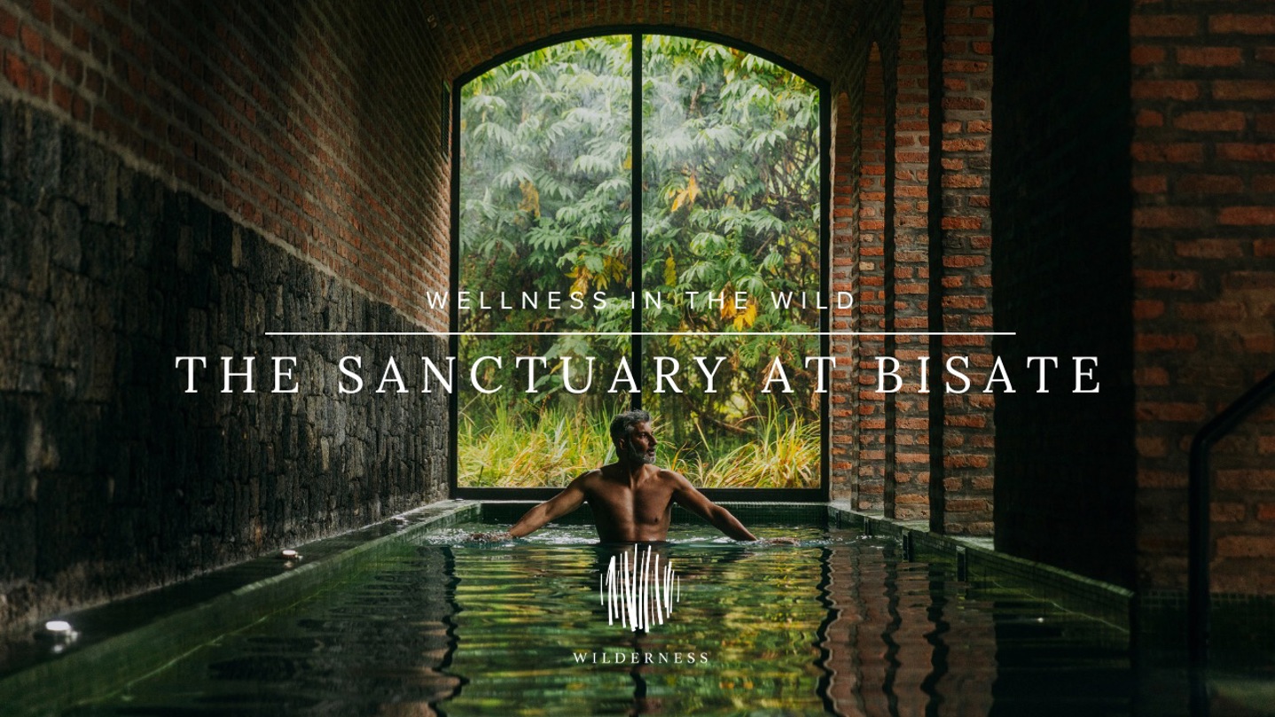 A male guest in the lap pool at The Sanctuary, Wilderness Bisate