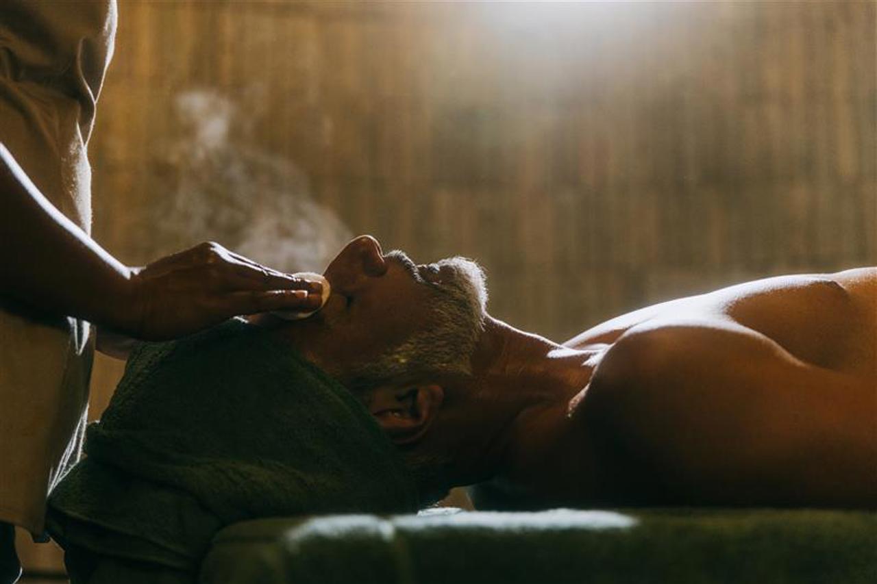 Guest enjoying a relaxing treatment at The Sanctuary at Wilderness Bisate 