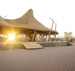 Relax on the deck at Wilderness Little Kulala