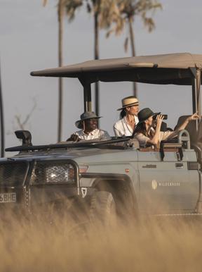 Persons on a game vehicle in Botswana