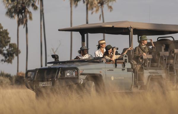 Persons on a game vehicle in Botswana