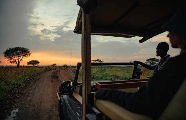 Enjoying the sunsetting over the plains of the Serengeti in Tanzania