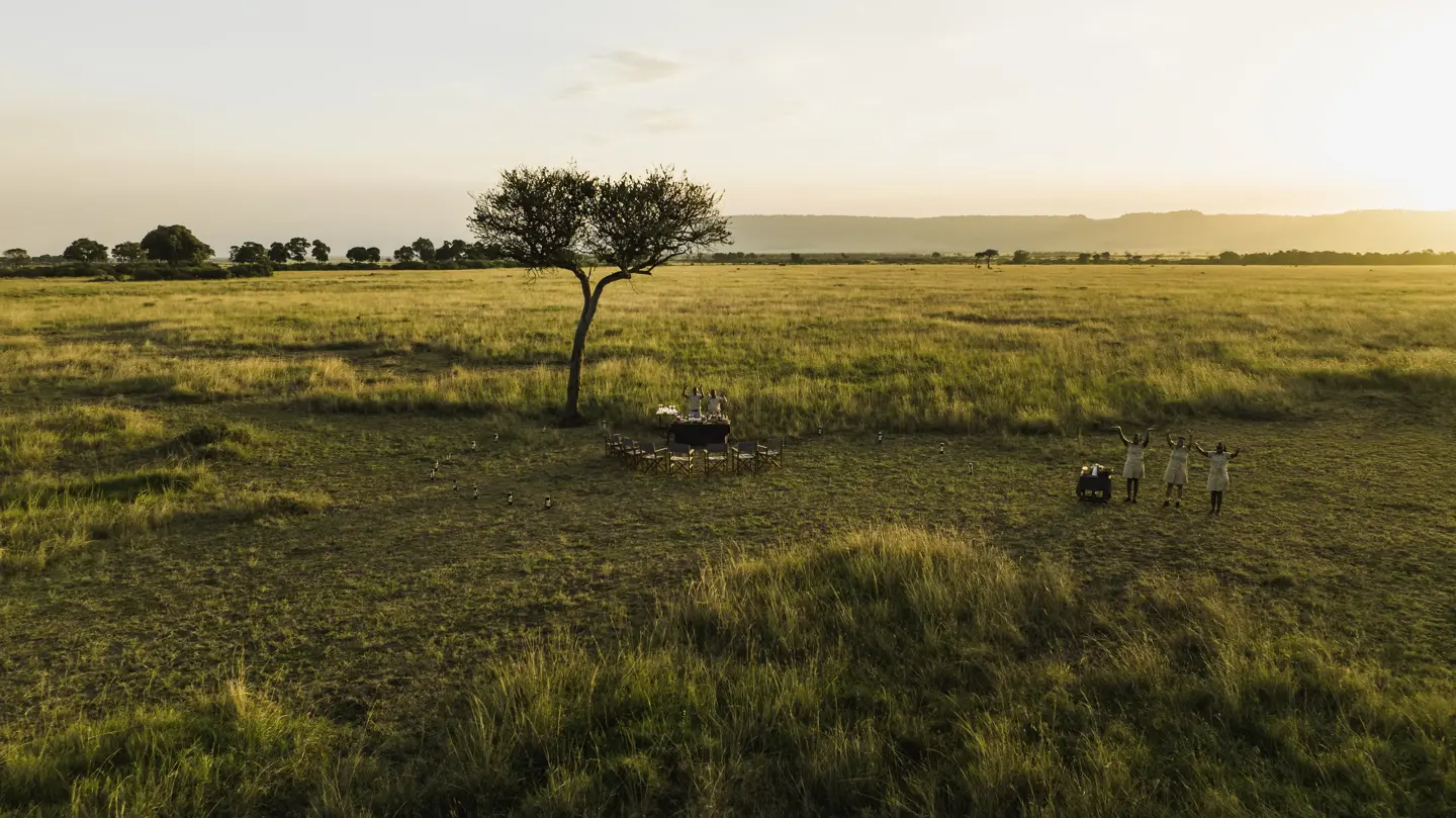 Guests enjoy a warm welcome from the Wilderness Mara staff out on safari 