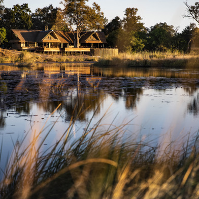 Wilderness Kings Pool Botswana Camp Aerial View with water in the channel