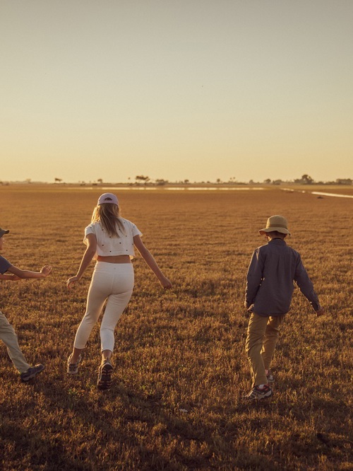 Family safari experience with children in African wilderness