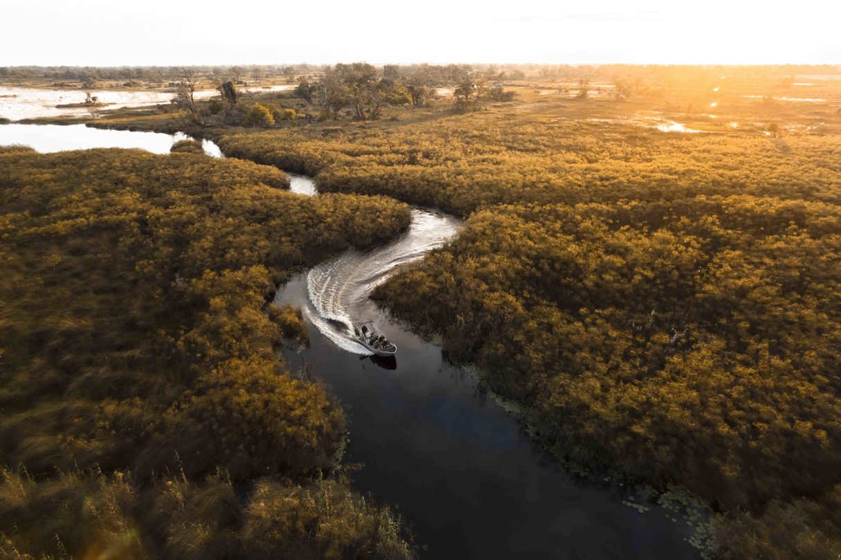 Wilderness Vumbura Plains Botswana Boating in Channels