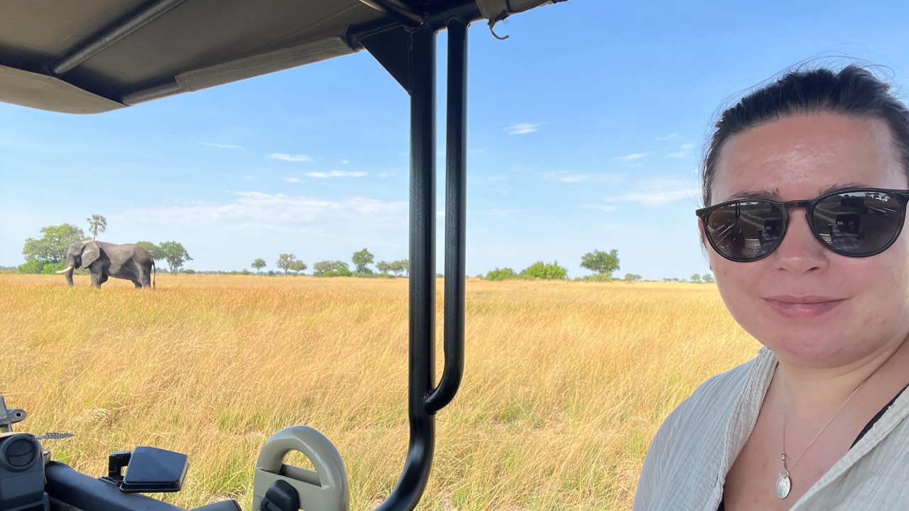 Woman on a game drive vehicle