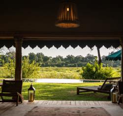 The main pool at Wilderness Mara as seen from the lounge area
