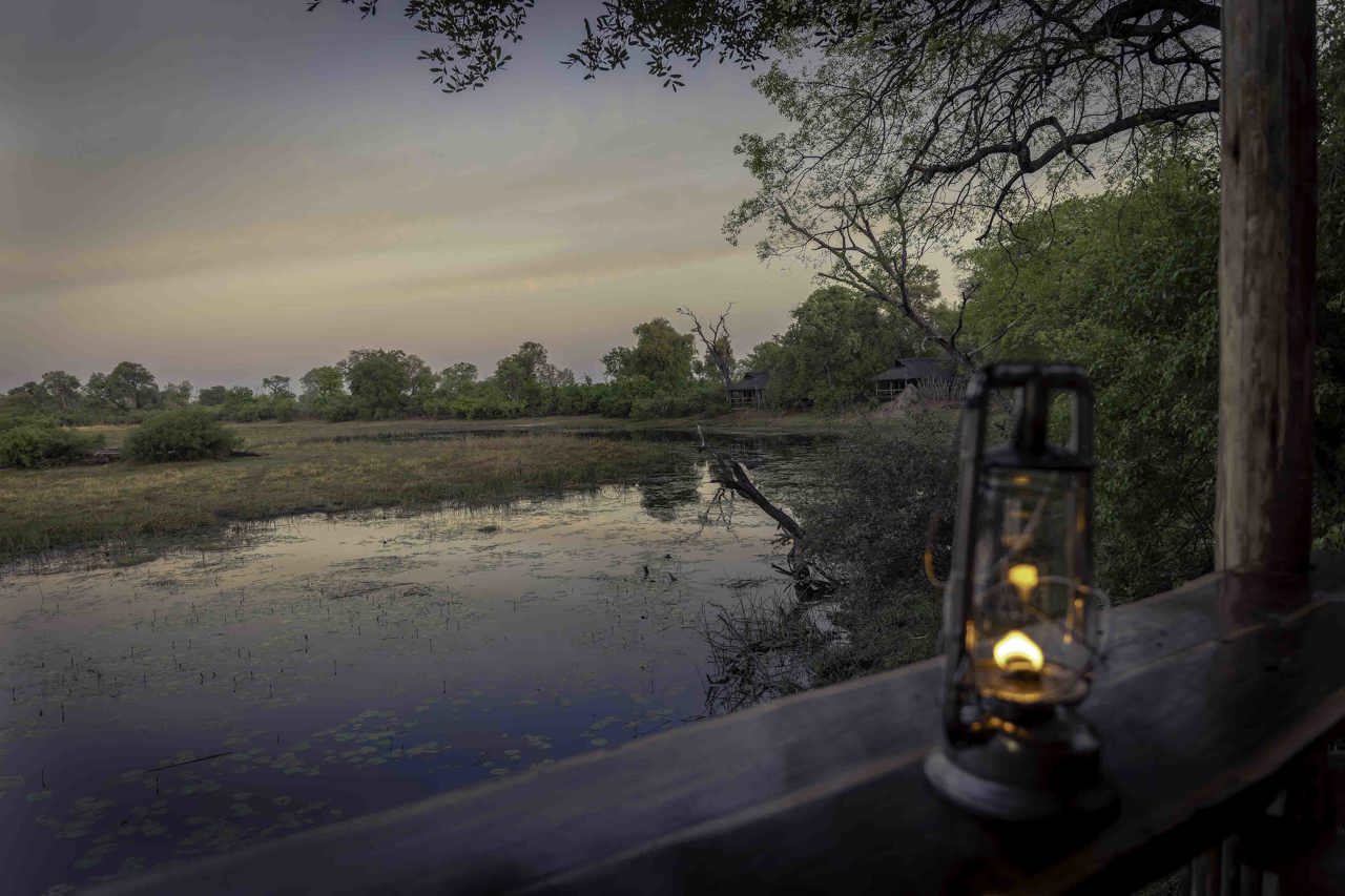 Sunset view over the river from the guest deck at Wilderness Savuti