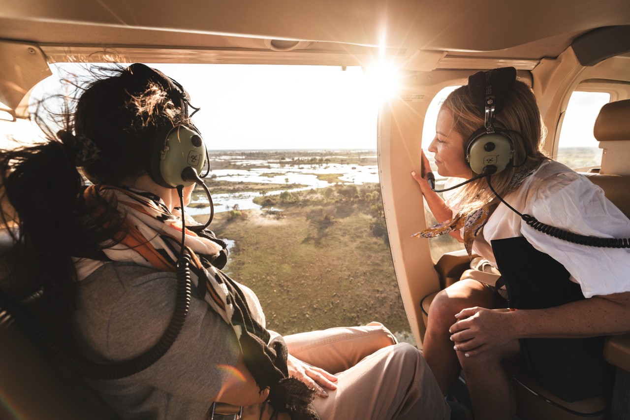Flying over the Okavango Delta in a private helicopter