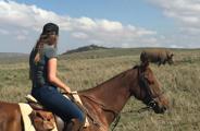 Woman on a horse in Kenya