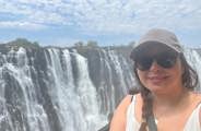 Woman posing At Victoria Falls Zambian Side