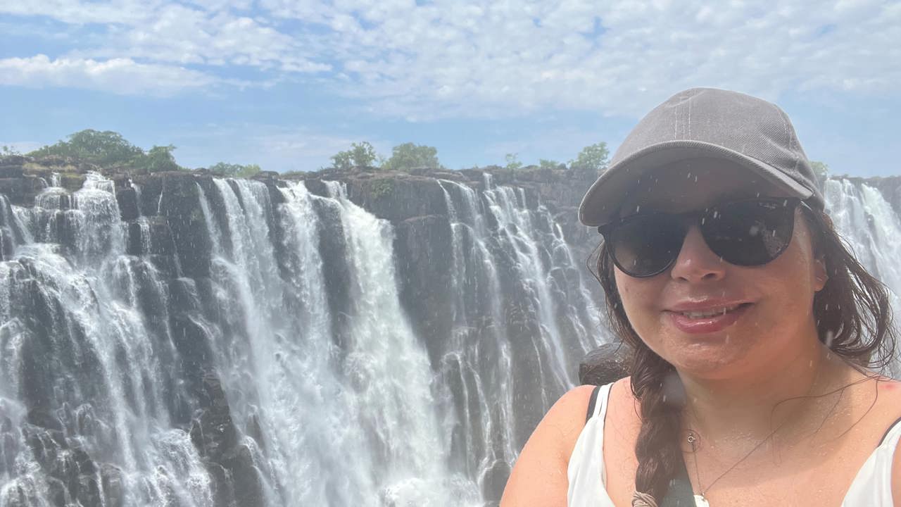 Woman posing At Victoria Falls Zambian Side