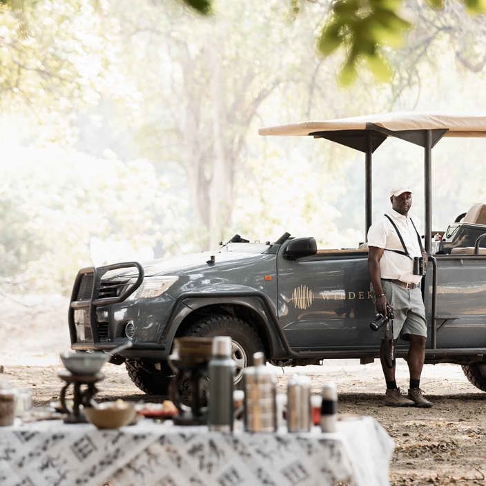 Coffee break on morning game drive Wilderness Ruckomechi