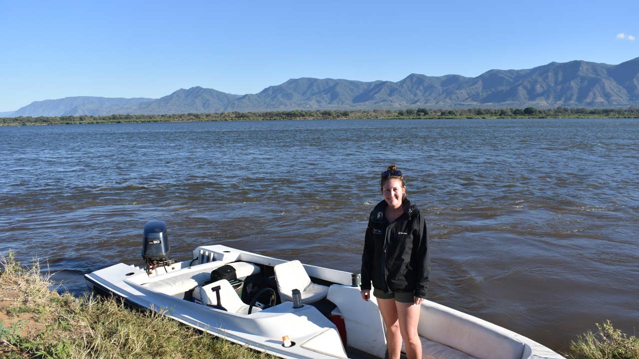 Woman on boat cruising down the Zambezi in Mana Pools 