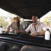 Couple enjoying game drive safari in Botswana with Wilderness