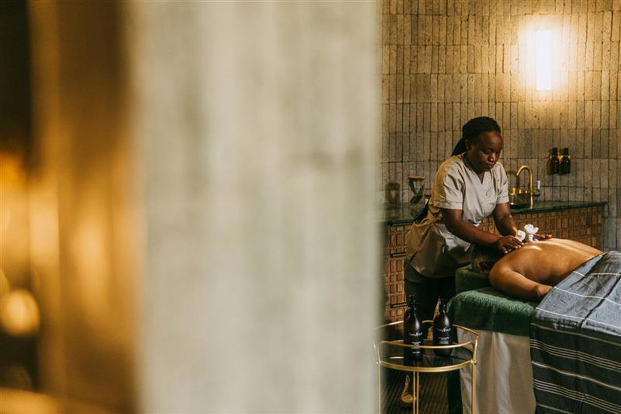 Guest receiving a spa treatment at The Sanctuary at Wilderness Bisate