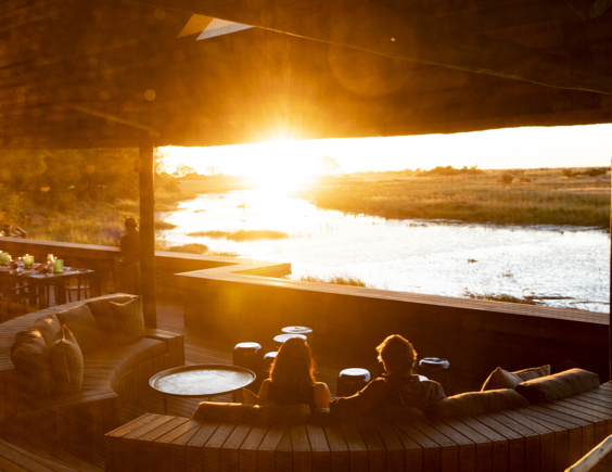 Wilderness Kings Pool Botswana Accommodation Main Lounge Sunset