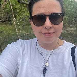 Woman posing whilst on n A Walking Safari At Sitatunga Okavango Delta