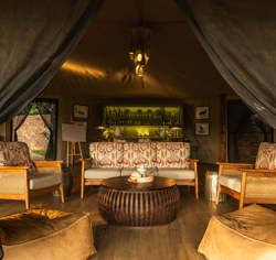 Guest lounge and bar area at Wilderness Mara in Kenya