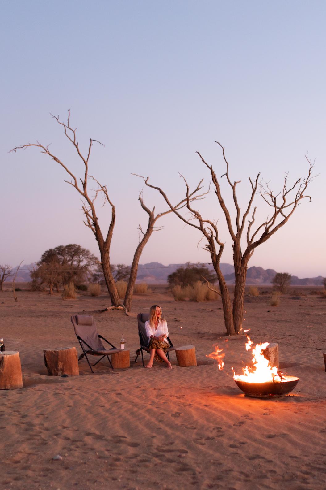 A guest Wilderness Little Kulala fire pit