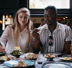 Couple dining in Cape Town with Wilderness Touring