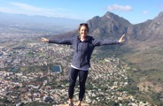 Woman on top of Lions Head in Cape Town