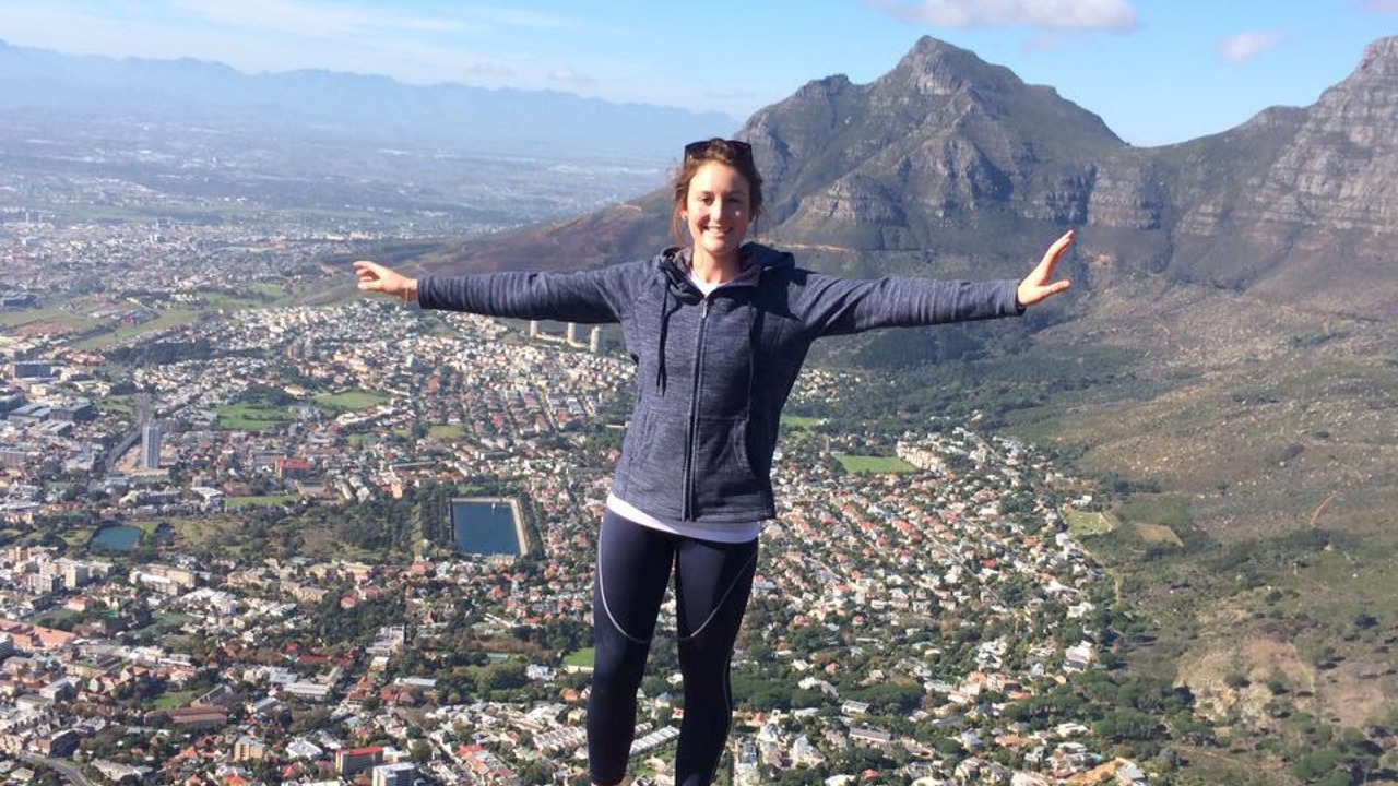 Woman on top of Lions Head in Cape Town