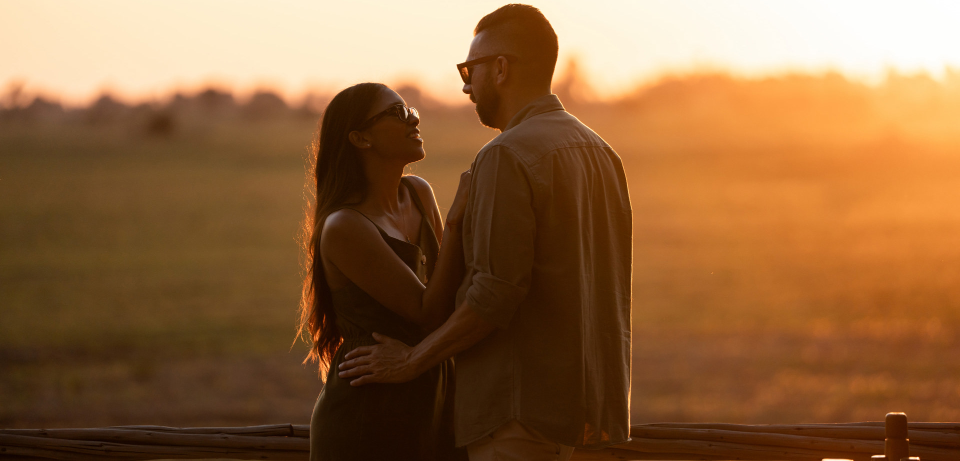 Honeymoon safari couple at sunset in Mombo Camp Botswana