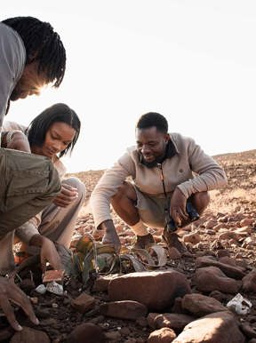 Guided nature walk at Wilderness Desert Rhino Camp